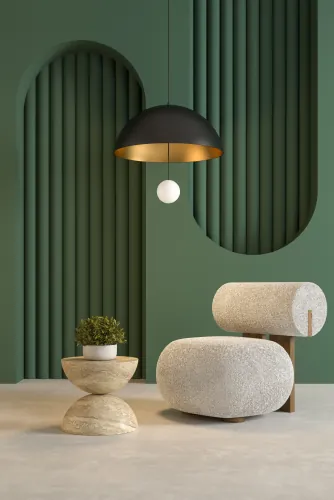 Dark green room with arched panels, a black pendant lamp and a bouclé chair